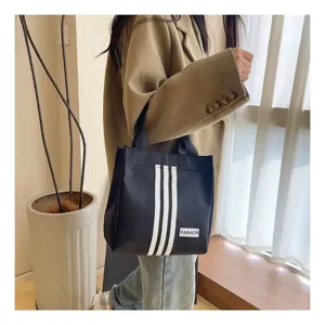 Elegante bolso tote negro de lona con rayas blancas, bolso casual de moda para mujer