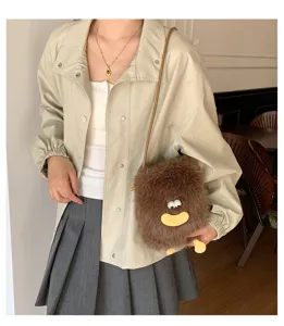 Cute furry crossbody bag for women, plush mini shoulder phone bag with funny design for daily wear.