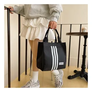 Bolso tote de lona negro con tres rayas estilo deportivo bolso de mano casual para mujeres
