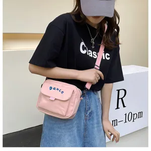 Pink nylon crossbody bag for women, cute sweet style casual shoulder bag daily use.