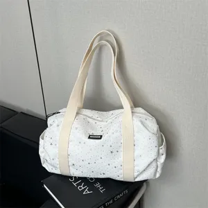 Élégant sac à bandoulière pour femme, grande capacité, idéal pour le yoga et le voyage.