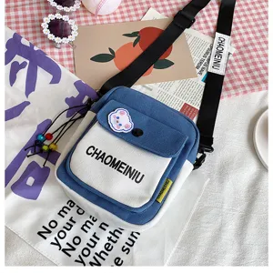 Borsa a tracolla in tela da donna, stile coreano alla moda, borsa messenger con graziosa spilla.