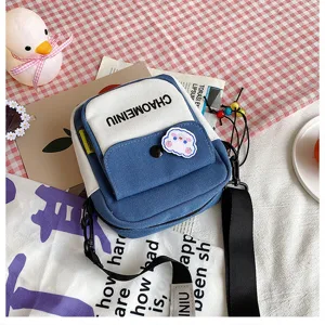 Graziosa borsa a tracolla in tela blu e bianca da donna, elegante borsa a spalla da studentessa.