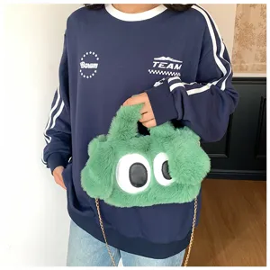 Joli sac bandoulière en peluche monstre dessin animé vert duveteux avec grands yeux femme.
