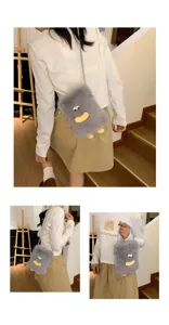 Cute grey plush crossbody bag for women, fluffy mini shoulder phone bag with funny big eyes.