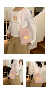 Cute pink plush crossbody bag with funny sausage mouth design, soft fluffy mini shoulder phone bag.