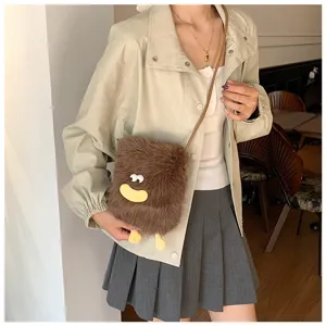 Cute plush crossbody bag for women, fuzzy mini shoulder bag with funny monster face.