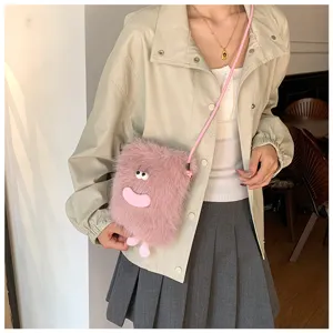Cute pink plush monster cross-body phone bag with funny sausage lips and soft fluffy texture.