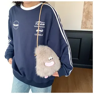 Cute fuzzy plush mini shoulder bag detail, grey crossbody phone bag with funny lips design.