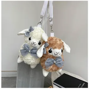 Cute plush alpaca crossbody bag with sweet bow design, soft furry shoulder bag for girls.