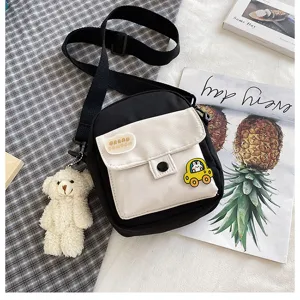 Canvas crossbody bag for women, cute Harajuku style shoulder bag with bear pendant and phone pouch.