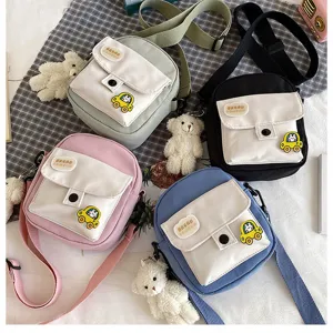 Cute Harajuku canvas crossbody bag for women, Japanese style aesthetic shoulder phone bag.