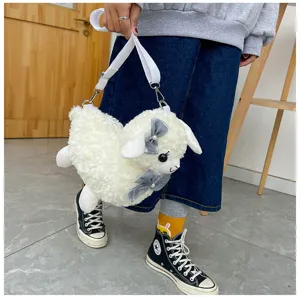 Plush alpaca crossbody bag detail showing soft white material and cute grey bow decoration.