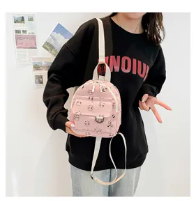 Cute pink corduroy mini backpack for women and students with adorable panda print design.