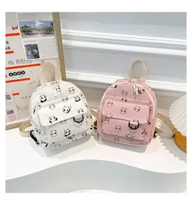 Cute mini backpack with adorable panda pattern, versatile schoolbag for women and girls daily.