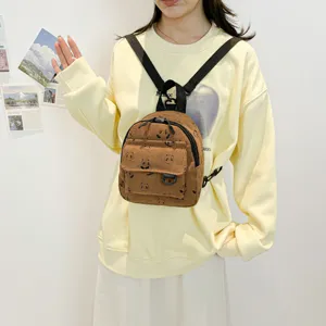 Brown corduroy mini backpack for women, cute panda print school bag and casual daypack.