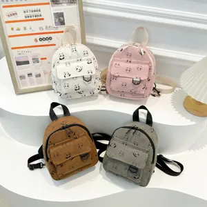 Cute mini corduroy backpack with panda print, versatile small school bag for women.
