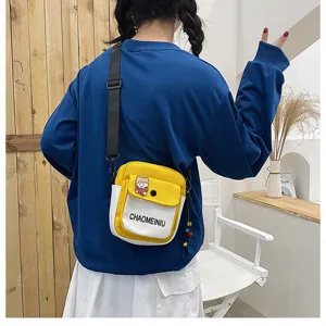 Borsa a tracolla in tela carina per donna, borsa a spalla gialla e bianca con orsetto.
