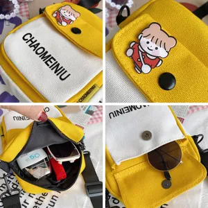 Carina borsa a tracolla in tela da donna con patch di cartoni, borsa gialla e bianca.