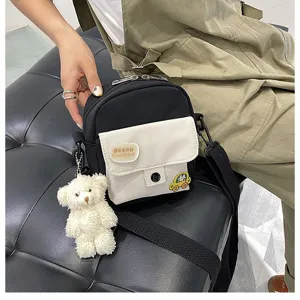 Small black and white canvas crossbody bag, cute casual shoulder bag with cute bear pendant.