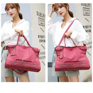 Detailed display shot showing women retro PU leather tote bag with stylish metal studs.