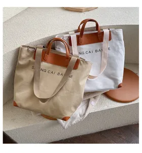 Large capacity canvas tote bag for women, casual single shoulder crossbody handbag.