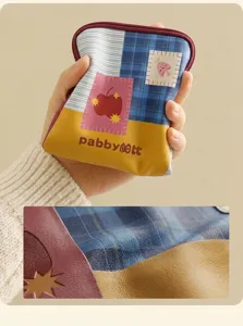 Portable travel jewelry storage bag, multi-layer waterproof leather case for rings and necklaces.