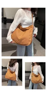 Casual canvas shoulder bag for women, large capacity crossbody tote, daily student bag.