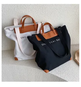 Canvas tote bag for women, stylish multi-use shoulder crossbody bag with leather trim.