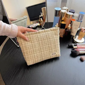 Tweed cosmetic bag with large capacity makeup pouch stylish storage bag for daily use.
