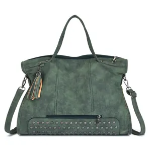 Close-up detail of retro green PU leather shoulder bag with chic metal studs and stylish tassel.