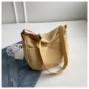 Sac bandoulière souple en tissu uni, grand sac cabas décontracté pour femme élégante.