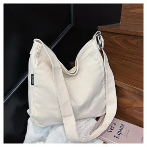 Casual canvas shoulder bag for women, large capacity crossbody hobo bag, daily student tote.