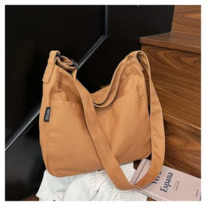 Brown canvas crossbody bag for women, large capacity casual shoulder bag daily use.