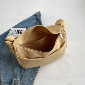 Grand sac porte epaule souple en tissu uni grande capacite sac bandouliere decontracte.