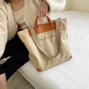 Korean style canvas tote bag, large capacity shoulder and crossbody handbag with leather handles.