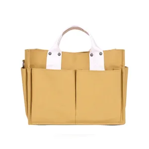 Canvas tote bag large capacity casual handbag stylish multi-pocket design for daily work school.