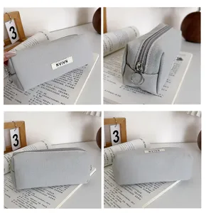 Grey canvas pencil case multi-angle detail view, large capacity student stationery storage bag.
