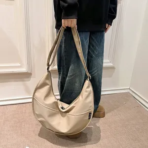 Korean style solid color nylon dumpling shoulder bag, casual large crossbody hobo bag.