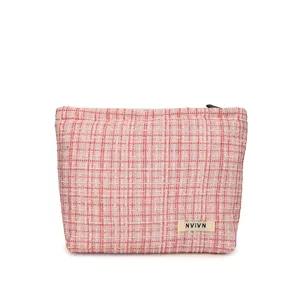 Pink tweed cosmetic bag, elegant large capacity makeup pouch and chic toiletry storage organizer.