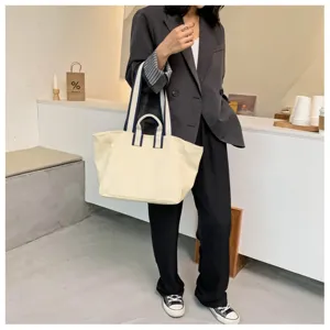 Casual large capacity canvas tote bag with blue stripes, perfect for daily commuting and work.