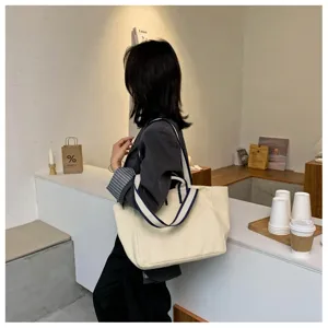 Canvas tote bag in off-white with striped straps, large capacity casual shoulder bag for daily.