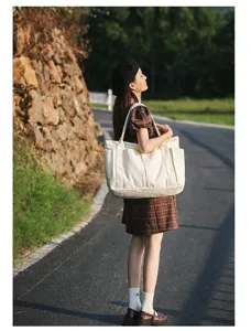 Large capacity canvas tote bag, simple Korean style shoulder handbag for daily commuting.
