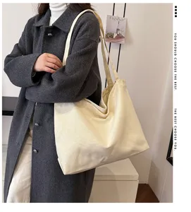 Casual canvas tote bag for women, large capacity daily shoulder shopping handbag.
