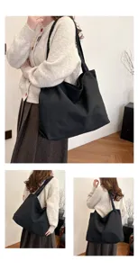 Detailed view of the casual black canvas tote bag worn by a model, showing daily style and capacity.