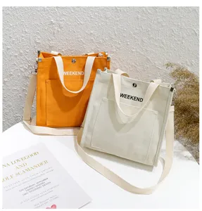 Casual canvas tote bag with letter print, stylish shoulder bag for daily use and students.
