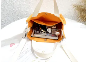 Yellow canvas tote bag with internal storage, perfect for daily casual use and travel.