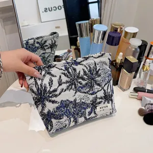 Trousse de maquillage élégante motif palmier bleu, grand sac cosmétique portable voyage.