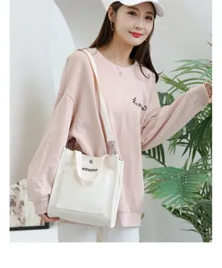 Japanese style white canvas tote bag for women, casual single shoulder bag with top handle.