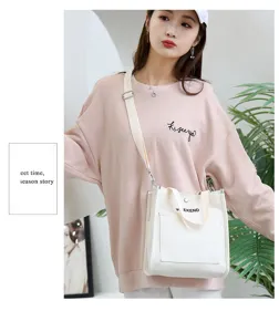 Fashionable casual canvas shoulder bag for women, versatile daily tote with adjustable strap.